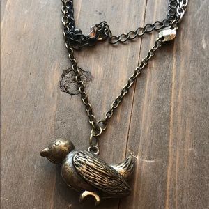 Bird charm necklace